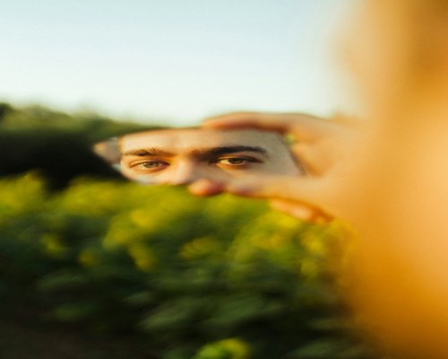 Person looking away from screen to relax eyes